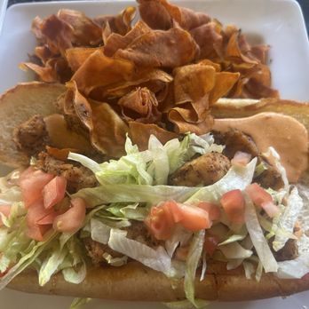 CorkScrew Bar & Grille - Blackened alligator po'boy - Bars Near Me - New Smyrna Beach, Florida CorkScrew Bar & Grille - Blackened alligator po'boy - Bars Near Me - New Smyrna Beach, Florida