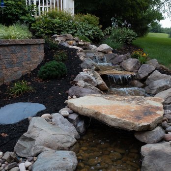 Creative Touch Landscapes - a water feature in a garden - Landscaping Near Me - Lebanon, Pennsylvania