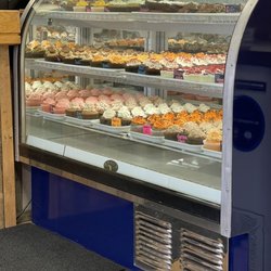 Hometown Sweets - Yummy cupcakes and desserts in their display case!
