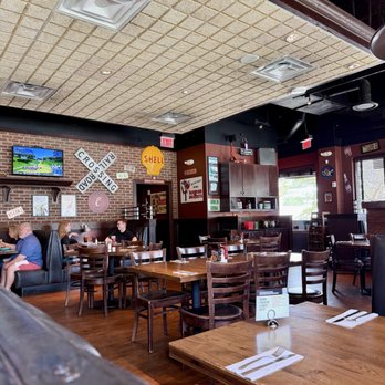 Rusty Bucket Restaurant and Tavern - Very fun signs all over the walls - American Near Me - Cincinnati, Ohio