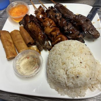 Salo-Salo Grill - BBQ Combination Plate (Pork rib, chicken / pork / beef skewers in one plate. Side of egg rolls - $19.00) - Filipino Near Me - Artesia, California Salo-Salo Grill - BBQ Combination Plate (Pork rib, chicken / pork / beef skewers in one plate. Side of egg rolls - $19.00) - Filipino Near Me - Artesia, California