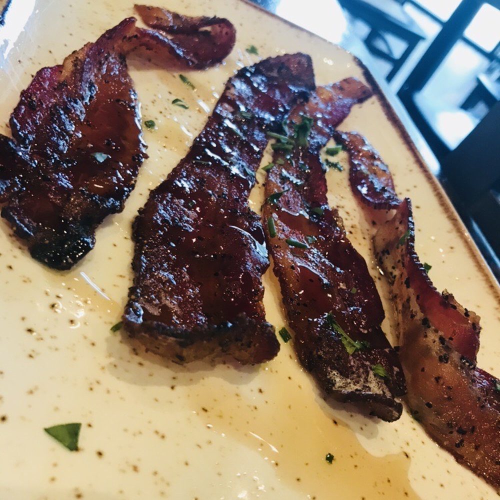 First Watch - Million dollar bacon. On their seasonal menu, thick cut, sweet and peppery. Really sticky, so be warned. - Breakfast & Brunch Near Me - Jacksonville, Florida First Watch - Million dollar bacon. On their seasonal menu, thick cut, sweet and peppery. Really sticky, so be warned. - Breakfast & Brunch Near Me - Jacksonville, Florida