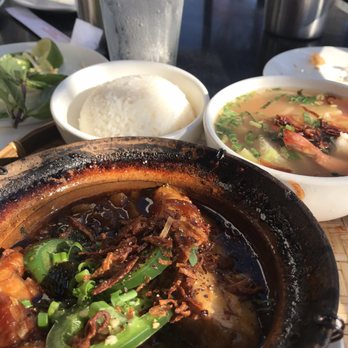 Shank & Bone - Fish cooked with herbs in clay pot, side of rice and shrimp soup - Vietnamese Near Me - San Diego, California Shank & Bone - Fish cooked with herbs in clay pot, side of rice and shrimp soup - Vietnamese Near Me - San Diego, California
