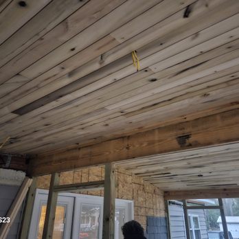 Reef Renovations - a person standing in a room with wood planks on the ceiling - Decks & Railing Near Me - Surfside Beach, South Carolina Reef Renovations - a person standing in a room with wood planks on the ceiling - Decks & Railing Near Me - Surfside Beach, South Carolina
