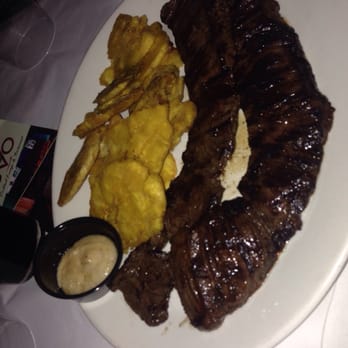 La Cocina Boricua - This picture is not doing this churrasco justice. Very tender, tasty & great sauces. Tostones came with garlic on the side too! - Puerto Rican Near Me - Bronx, New York La Cocina Boricua - This picture is not doing this churrasco justice. Very tender, tasty & great sauces. Tostones came with garlic on the side too! - Puerto Rican Near Me - Bronx, New York