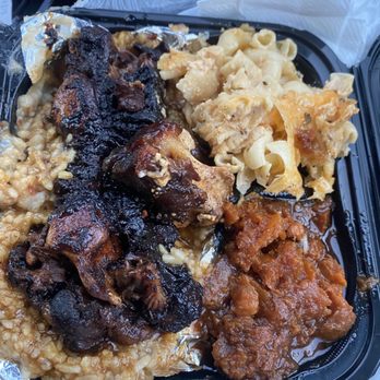 Throwdown Soulfood - Oxtail plate Tender oxtails* Served with rice & gravy and your choice of two additional sides - Soul Food Near Me - Long Beach , California