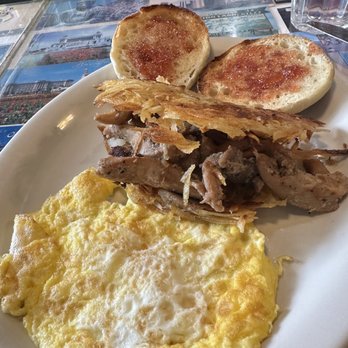 Art's Cafe - Dajgogi (chicken) hash brown sandwich with scrambled eggs and English Muffin - Diners Near Me - San Francisco, California Art's Cafe - Dajgogi (chicken) hash brown sandwich with scrambled eggs and English Muffin - Diners Near Me - San Francisco, California