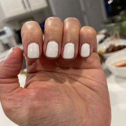 French Nails & Spa - Thick gel on, crooked, barely did a manicure/cleaning.
