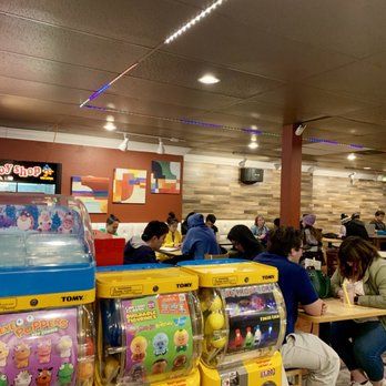 Tea N More - Overview of tables and some quirky Japanese toy slots. - Coffee & Tea Near Me - San Diego, California