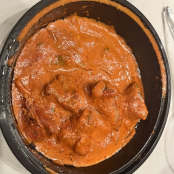 Bombay Corner - This is the Lamb Tikki Masala, after I had already eaten half. It's a generous serving. - Indian Near Me - Miami, Florida Bombay Corner - This is the Lamb Tikki Masala, after I had already eaten half. It's a generous serving. - Indian Near Me - Miami, Florida