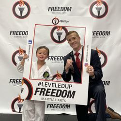 Freedom Martial Arts - Our son and Master Myers as his level up ceremony where he received his green turtle belt.