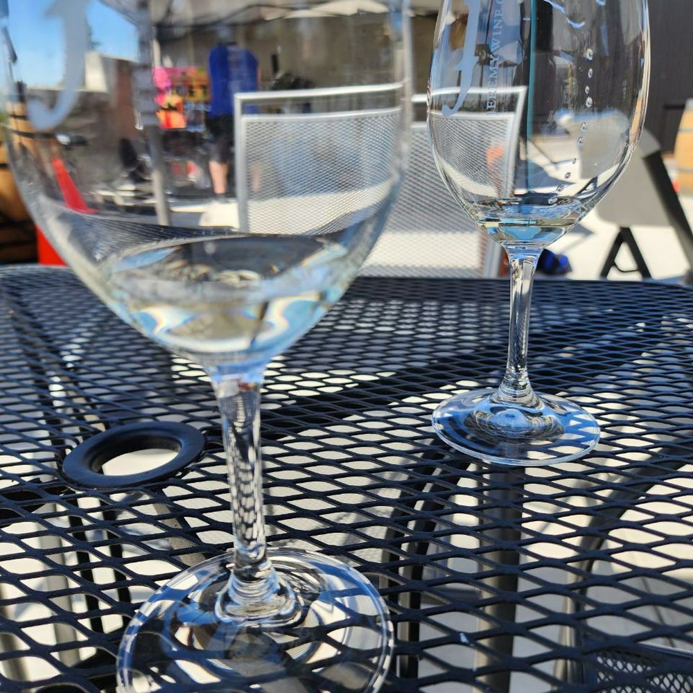 Jeremy Wine - two wine glasses on a table - Wine Tasting Room Near Me - Lockeford, California Jeremy Wine - two wine glasses on a table - Wine Tasting Room Near Me - Lockeford, California