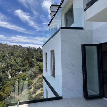 Shower Royale - Outdoor railing glass with base-shoe. - Glass & Mirrors Near Me Shower Royale - Outdoor railing glass with base-shoe. - Glass & Mirrors Near Me