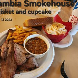 Zambia Smokehouse - All Day Dining meal. Brisket, beans, fries, toast (entrée credit). Cupcake (dessert credit). Unsweet tea (drink credit)
