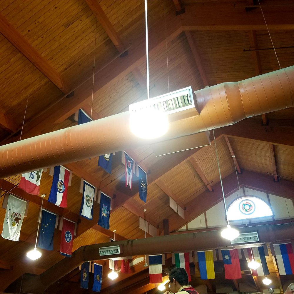 Camp Friedlander - In the dining hall, flags hang from every state and country campers have visited from. Many more are hung. - Campgrounds Near Me - Loveland, Ohio