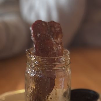 Merle's Whiskey Kitchen - The candied maple bourbon bacon - Cocktail Bars Near Me - Louisville, Kentucky Merle's Whiskey Kitchen - The candied maple bourbon bacon - Cocktail Bars Near Me - Louisville, Kentucky