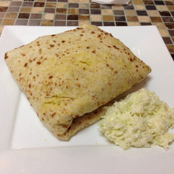 Radica's Hot & Spicy - Boneless Curry Goat Roti - Caribbean Near Me - Brampton, Ontario Radica's Hot & Spicy - Boneless Curry Goat Roti - Caribbean Near Me - Brampton, Ontario