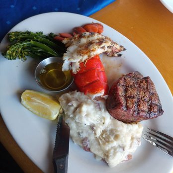 Cedars Floating Restaurant - The steak and lobster dish with garlic mashed potatoes. - Seafood Near Me - Coeur D'alene, Idaho Cedars Floating Restaurant - The steak and lobster dish with garlic mashed potatoes. - Seafood Near Me - Coeur D'alene, Idaho