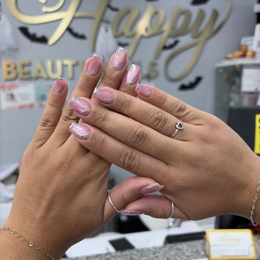 Silver spiderwebs on pink nails