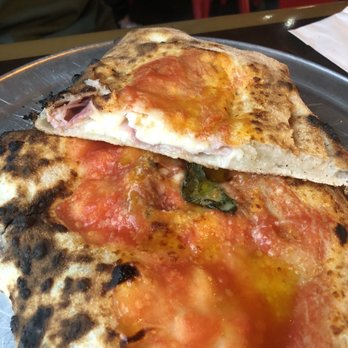 Pummarola - Midtown - Meat lovers pizza turned into a calzone - Pizza Near Me - Miami, Florida
