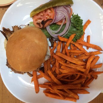 La Plazuela - Carnitas de Puerco sándwich with sweet potato fries. - New American Near Me - Santa Fe, New Mexico La Plazuela - Carnitas de Puerco sándwich with sweet potato fries. - New American Near Me - Santa Fe, New Mexico
