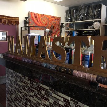 Naan Stop - Namaste sign inside - Indian Near Me - Isla Vista, California