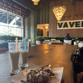 Vavela Cafe - Pistachio latte and Nutella strawberry croissant - Desserts Near Me - Charlotte, North Carolina Vavela Cafe - Pistachio latte and Nutella strawberry croissant - Desserts Near Me - Charlotte, North Carolina