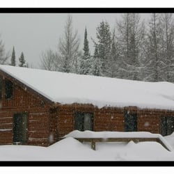The Log Cabin Retreat - Our winter wonderland at the peak of snowmobile season.