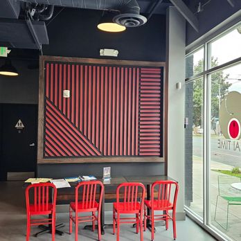 Thai Time - a restaurant with red chairs and a large painting - Thai Near Me - Sacramento, California Thai Time - a restaurant with red chairs and a large painting - Thai Near Me - Sacramento, California