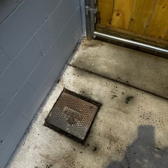 Premier Fence - The owner told me that the sewer was not marked and are not their responsibility. This sewer clean out is where they placed the post. - Fences & Gates Near Me - Murfreesboro, Tennessee