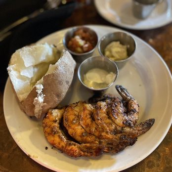 Outwest - Grilled Shrimp (blackened) with baked potato - Steakhouses Near Me - Kernersville, North Carolina Outwest - Grilled Shrimp (blackened) with baked potato - Steakhouses Near Me - Kernersville, North Carolina