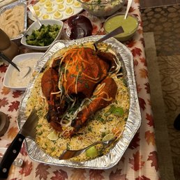 Thanksgiving tandoori turkey with vegetable biryani, a side of chutney, salad, mashed Potatoes and gravy! So delicious!!!!! Thanksgiving tandoori turkey with vegetable biryani, a side of chutney, salad, mashed Potatoes and gravy! So delicious!!!!!
