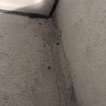 Right Team Construction - Foundational cracks in New staircase into entry of basement - Roofing Near Me