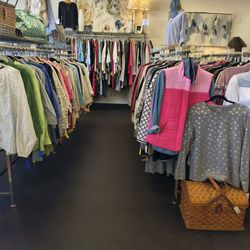 Smith & Co. Consignment - Woman clothes/bags and some art work as well on the walls