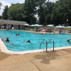 Falling Creek Farms Recreation Association - L- shaped pool with diving well , clubhouse in background.