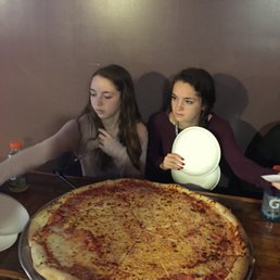 Yes - that's one pizza.  No photoshop involved.