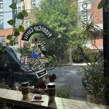 PennyCup Coffee - Front seating area - Coffee & Tea Near Me - Asheville, North Carolina PennyCup Coffee - Front seating area - Coffee & Tea Near Me - Asheville, North Carolina
