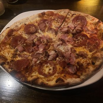 Aspen Creek Grill - Cheesy Carnivore Pizza - Seafood Near Me - Irving, Texas Aspen Creek Grill - Cheesy Carnivore Pizza - Seafood Near Me - Irving, Texas
