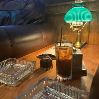 Bruton's Cigar Shop - a glass of coke and a cigarette - Cigar Bars Near Me - Plant City, Florida Bruton's Cigar Shop - a glass of coke and a cigarette - Cigar Bars Near Me - Plant City, Florida