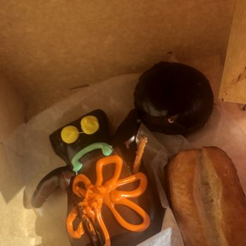 Voodoo Doughnut - double chocolate, voodoo doll, and buttermilk bar - Donuts Near Me - Houston, Texas Voodoo Doughnut - double chocolate, voodoo doll, and buttermilk bar - Donuts Near Me - Houston, Texas