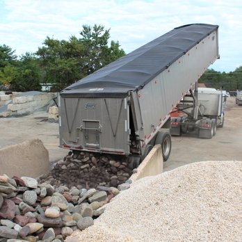 Virginia Ground Covers - Unloading a fresh shipment of decorative stone for our inventory. - Building Supplies Near Me - Sterling, Virginia Virginia Ground Covers - Unloading a fresh shipment of decorative stone for our inventory. - Building Supplies Near Me - Sterling, Virginia
