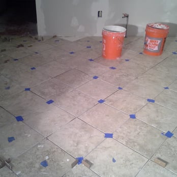 Kitchen Wizard and More - Marked in blue are the tile misalignment and lipage issues on the install by Tony Skulitz of the Kitchen Wizard and More LLC - General Contractors Near Me Kitchen Wizard and More - Marked in blue are the tile misalignment and lipage issues on the install by Tony Skulitz of the Kitchen Wizard and More LLC - General Contractors Near Me