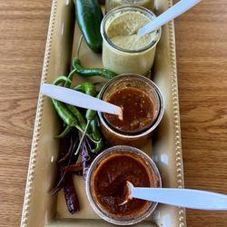Rich Tacos - Assorted salsas and hot things to heat things up!