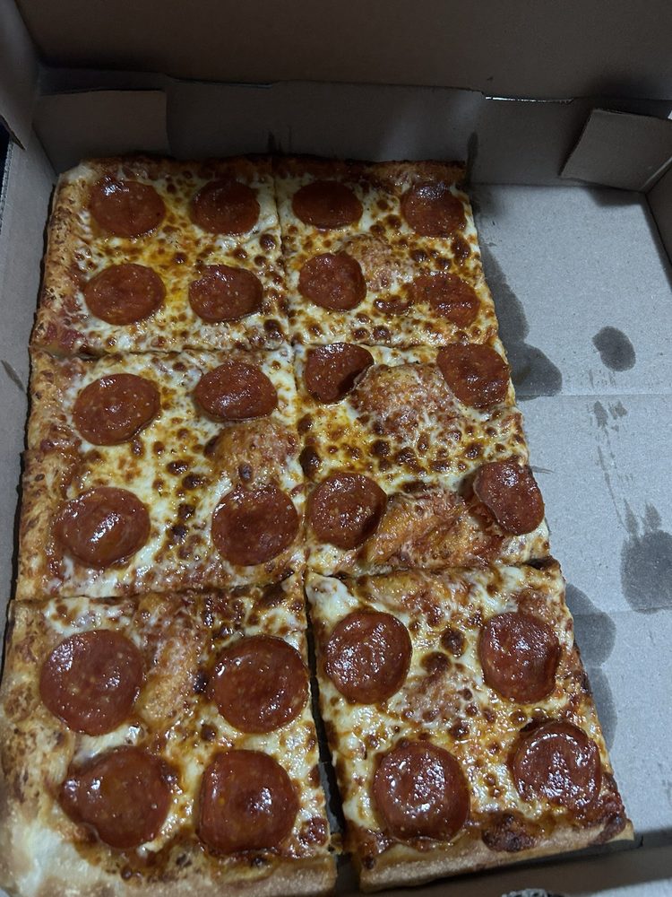 Casto's Pizza & chicken Logo