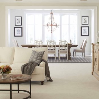Floormax - a living room with a couch and a coffee table - Flooring Near Me - Elkridge, Maryland Floormax - a living room with a couch and a coffee table - Flooring Near Me - Elkridge, Maryland