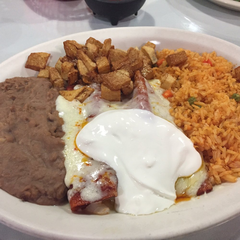 La Tortilandia - My cheese & onion enchiladas with sour cream sauce. Soooo much food. - Mexican Near Me - Fort Worth, Texas La Tortilandia - My cheese & onion enchiladas with sour cream sauce. Soooo much food. - Mexican Near Me - Fort Worth, Texas