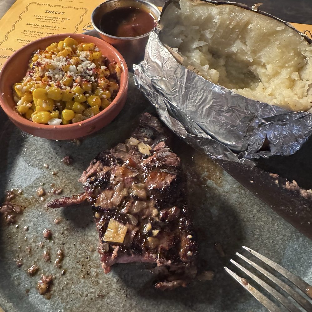 Trailborn Grand Canyon - New York Strip, corn dish, baked potato with a dash of tequila BBQ Sauce - Hotels Near Me - Williams, Arizona