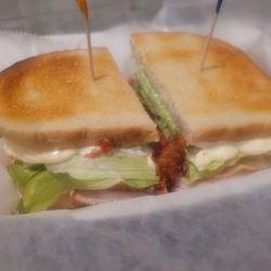 Valhalla Coffee & Kava Lounge - TURKEY & CHICKEN BLT: Sliced turkey and chicken with lettuce, tomato, bacon, and a layer of mayo. Served on your choice of bread.