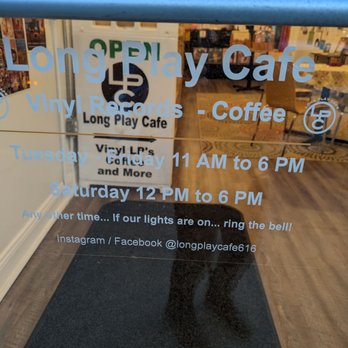 Long Play Cafe - a person standing in front of a glass door - Coffee & Tea Near Me - Pittsburgh, Pennsylvania Long Play Cafe - a person standing in front of a glass door - Coffee & Tea Near Me - Pittsburgh, Pennsylvania