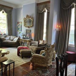R&B Bed and Breakfast - Living room with windows overlooking Frenchmen street